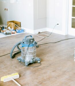 vacuum on floor of construction clean up site